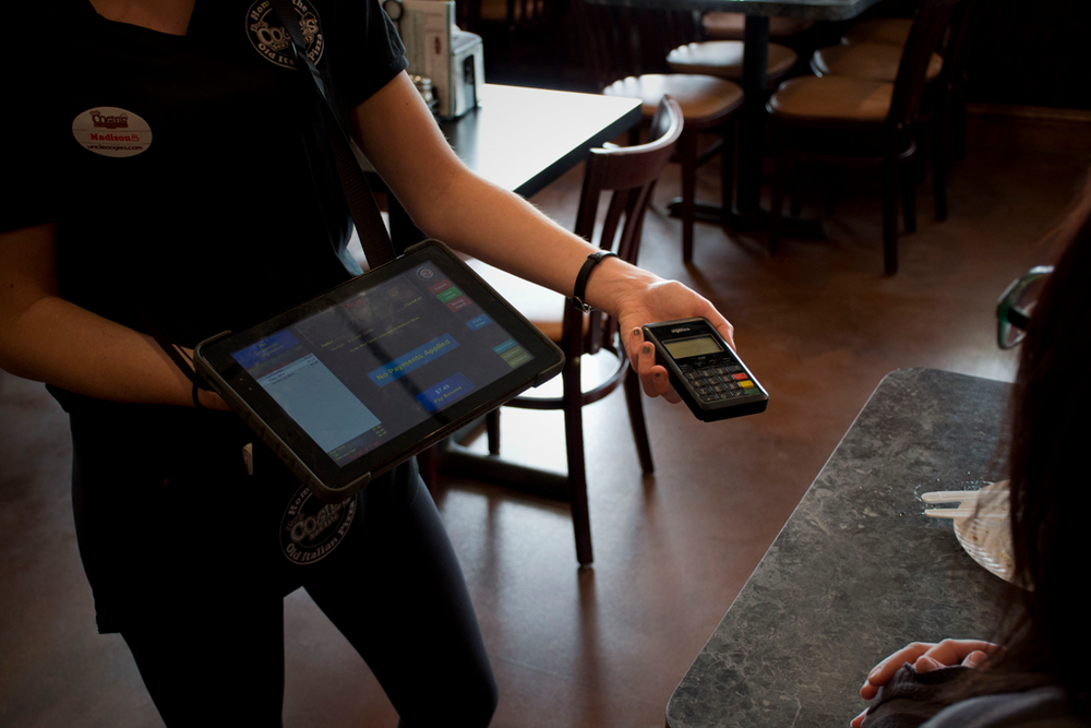 A Point of Sale partner utilizing Ingenico's iCMP Bluetooth-enabled EMV PIN Pad with a Windows tablet for Pay-at-Table